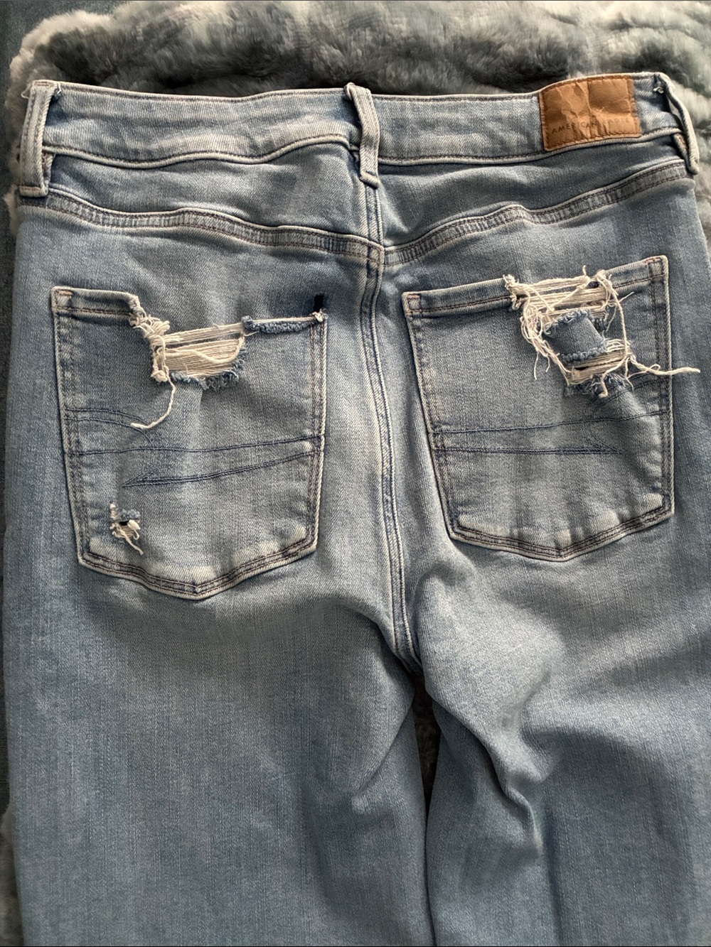 AE Light Wash Distressed Flare Jeans - Women - Picture 7 of 12